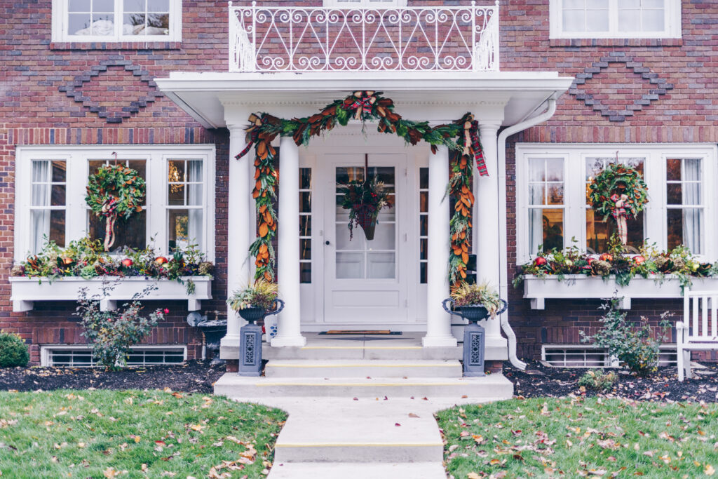 White front door with wreath