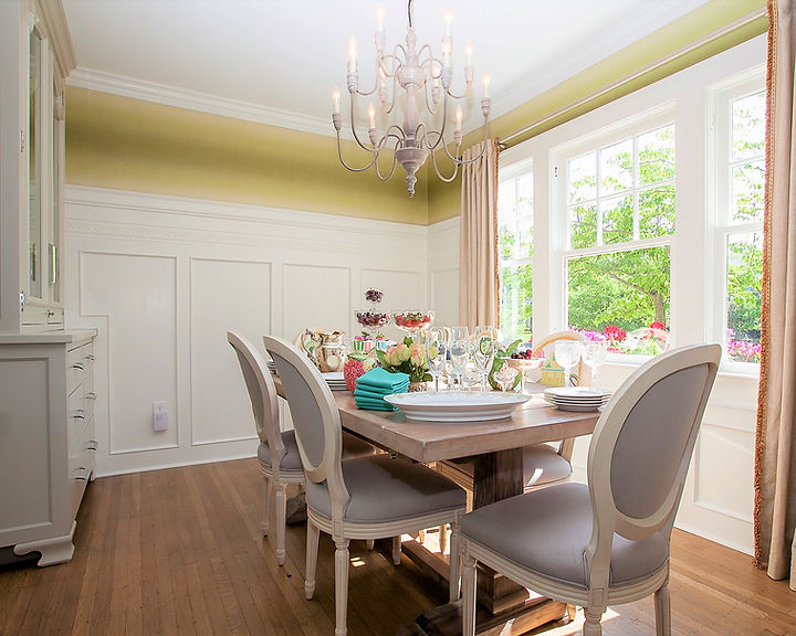 Dining room with table, chairs, and chandelier  